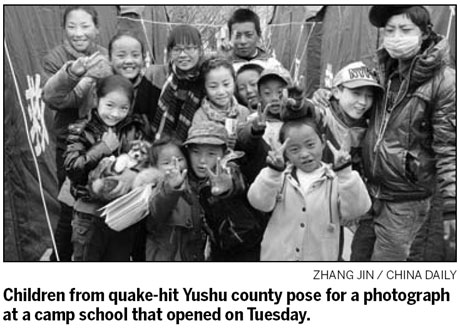 Schools begin again in quake-hit region