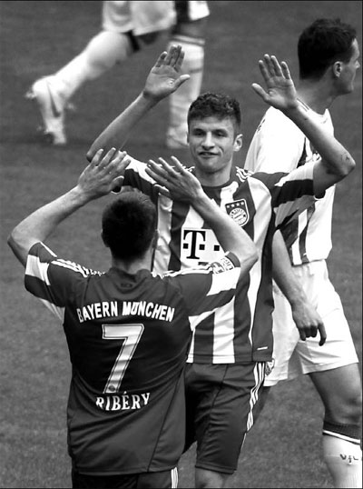 Bayern's title is relief for hat-trick star Mueller