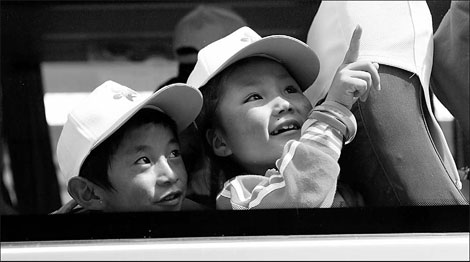 Quake orphans brought to capital