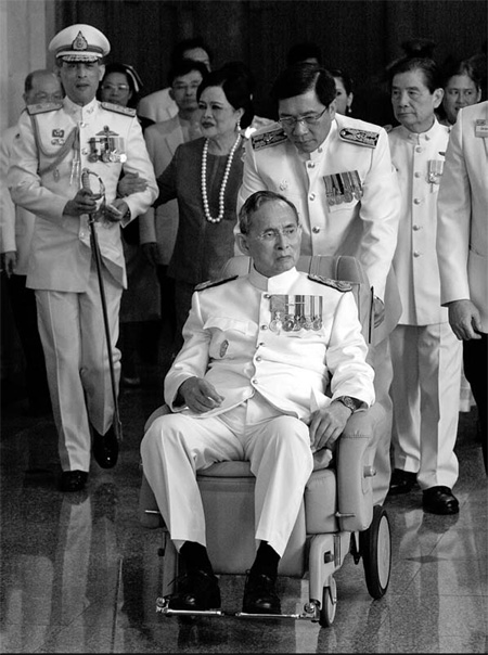 Thai king still revered as monarchy's power wanes