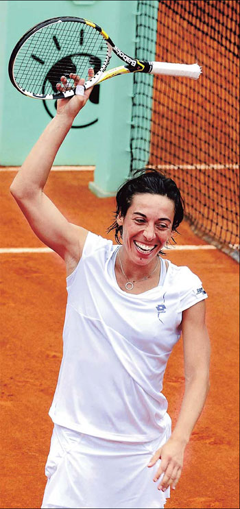 Victorious Schiavone achieves first for Italy