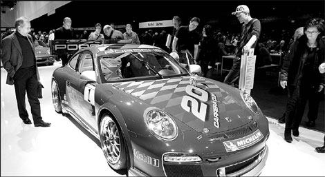 Porsche reports loss on merger