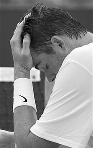 Marathon man Isner runs out of steam