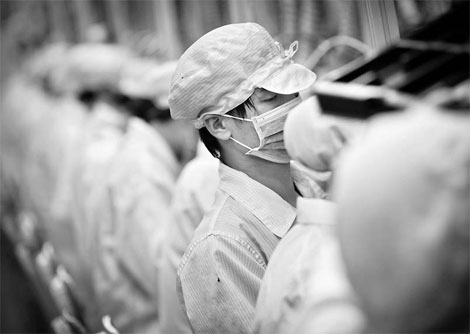 Foxconn cuts growth target