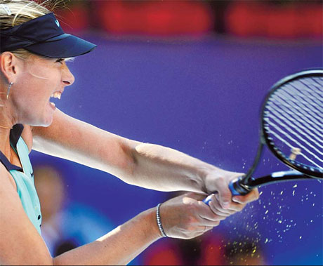 Stosur, Kuznetsova upset, China's Li cruises through