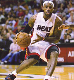 LeBron makes victorious Miami debut