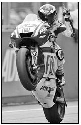 Lorenzo clinches maiden MotoGP title