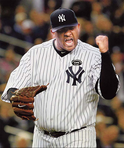 Yankees win to stay alive