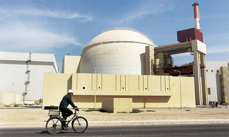 Iran inserts fuel into its first nuclear plant, causing concern