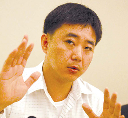 Zhang painting a bright future for his students
