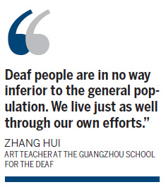 Zhang painting a bright future for his students