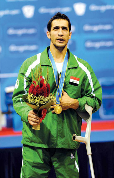 Hussein lifts spirits in homeland