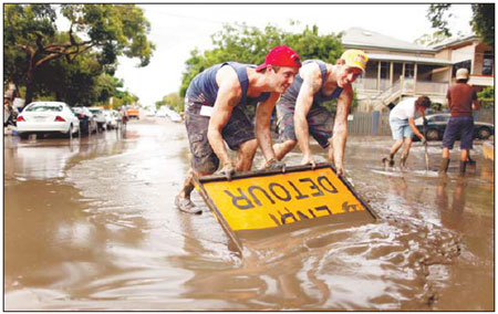 Brisbane flood cleanup starts as damage emerges