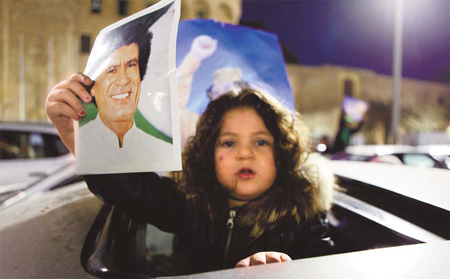 Libyan protests spread; death toll reaches 100