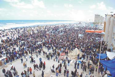 Protests in Libya reach the capital, dozens dead