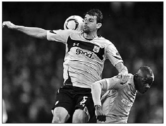 Liverpool scrapes into last 16 with Ajax, Benfica