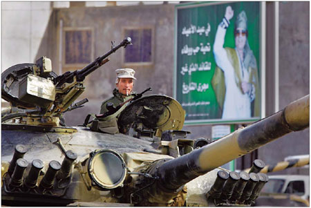 Defiant Gadhafi deploys forces