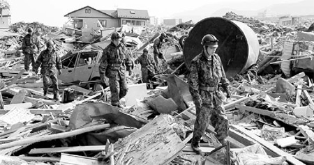 Troops doubled for relief efforts, world rushes aid