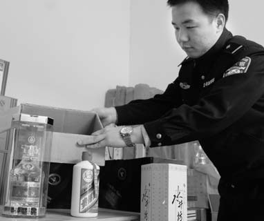 Police crack 2 billion yuan fake liquor racket