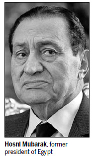 Egypt's Mubarak detained for 15 days in graft probe, suffers 'heart crisis'