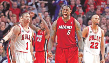 James, Wade lead charge as Heat eliminate Bulls