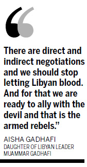 Rockets push rebels back south of Tripoli