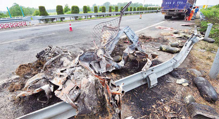 Early-morning rear-ender and inferno claim 23 lives, injure 29
