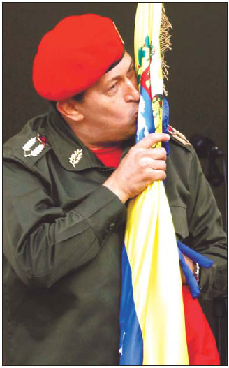 Chavez receives hero's welcome, defiantly vows to beat cancer