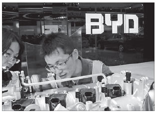 BYD shares skid on profit warning