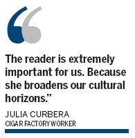 Cigar factory keeps oral tradition smoking