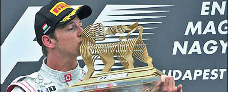 Stirring win for Button in 200th Grand Prix