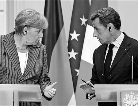 Sarkozy and Merkel push for additional EU integration and fiscal governance