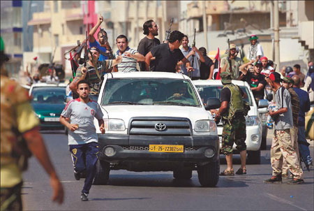 Rebels seek gadhafi