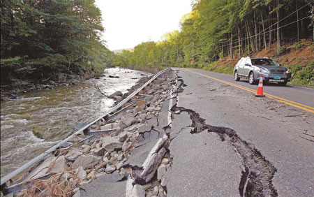 Irene's death toll reaches 46 as US towns battle heavy flooding