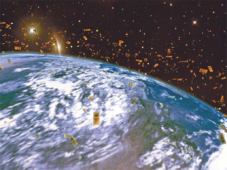 Lifeless satellite falls back to Earth