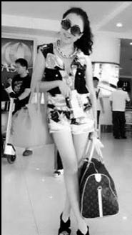 Official's daughter in trouble over photos