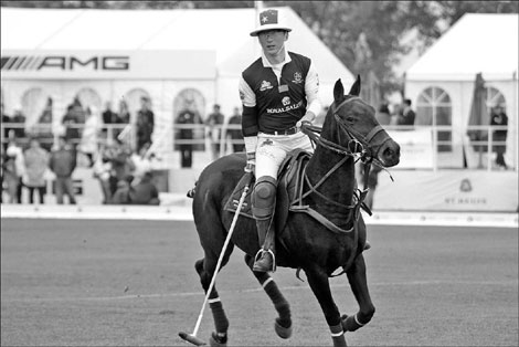 A man, his horse, His mallet, his life