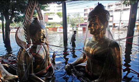 Bangkok floods recede in some places