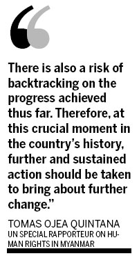 Myanmar panel says Suu Kyi can run for parliament