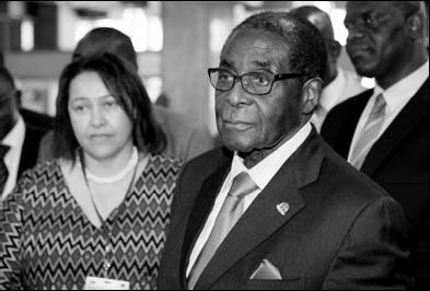 Mugabe praises coalition government with rivals