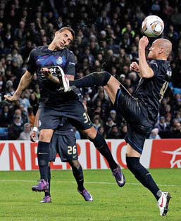 Mancini ends Tevez feud after City victory