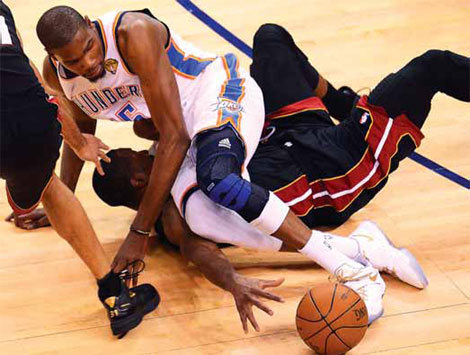 Heat survive rally to tie series