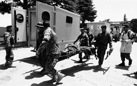 18 dead after Afghan hotel siege