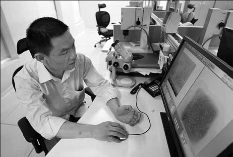 The man who seeks clues in fingerprints