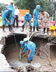 Pavement collapses in heavy rains