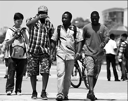 Agencies help foreigners evade rules to land jobs