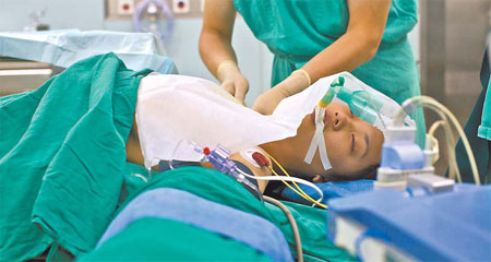 Moms, sons recover after first paired liver donations
