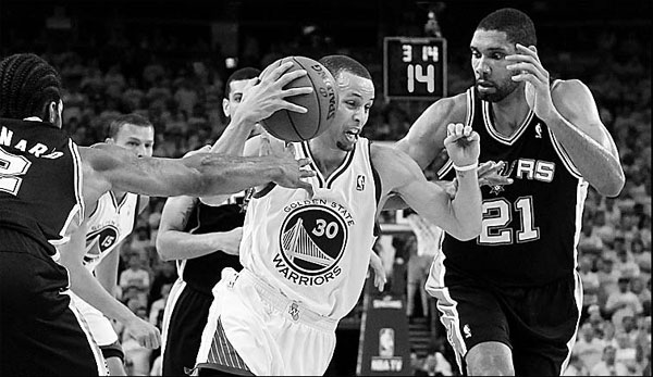 Spurs hold off Warriors to reach West finals