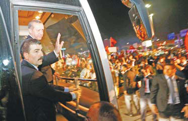 Turkish PM cheered in show of strength as protests continue