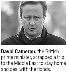 British PM warns of worsening floods